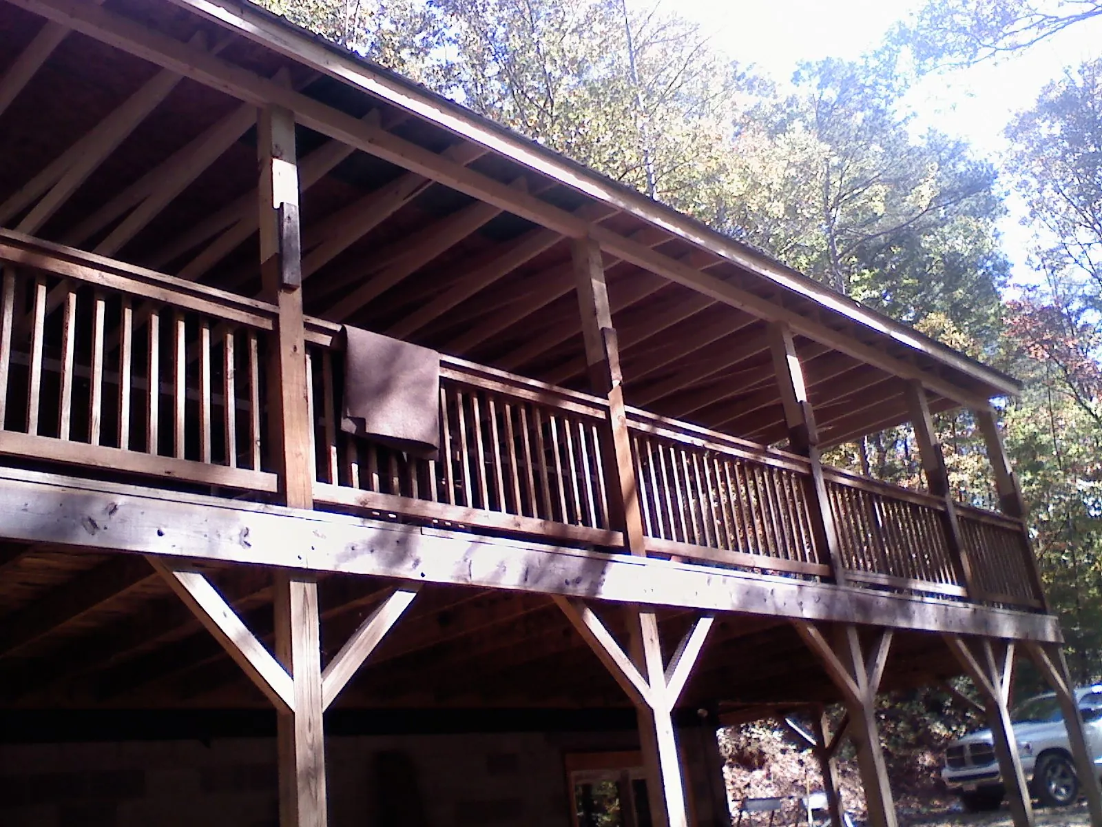 Timber framing under a new elevated porch and deck — Roof Leak Repair in Urbana by Roofing Brothers